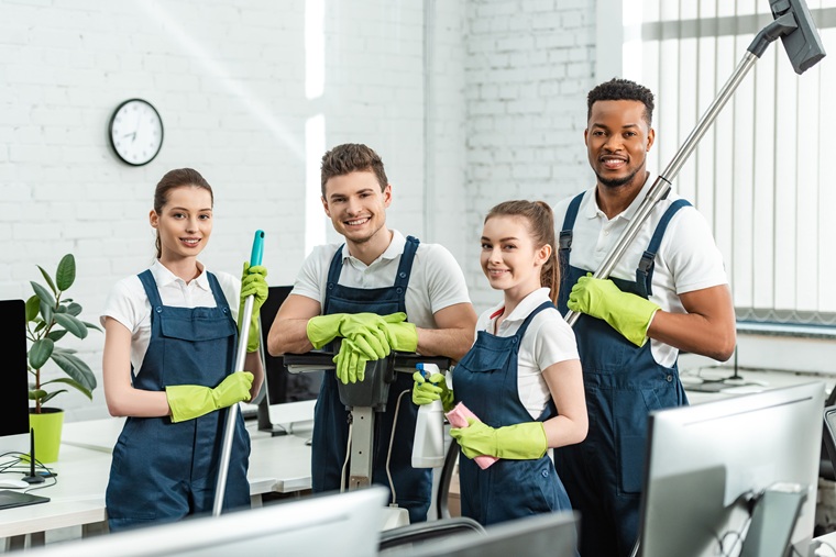 happy multicultural cleaners looking at camera whi 2022 12 16 19 15 01 utc 69a8a1b3654f8